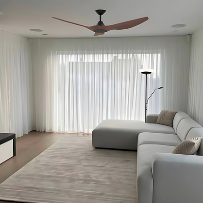 Domus Strike 60" black walnut ceiling fan installed in a living room with wood accents